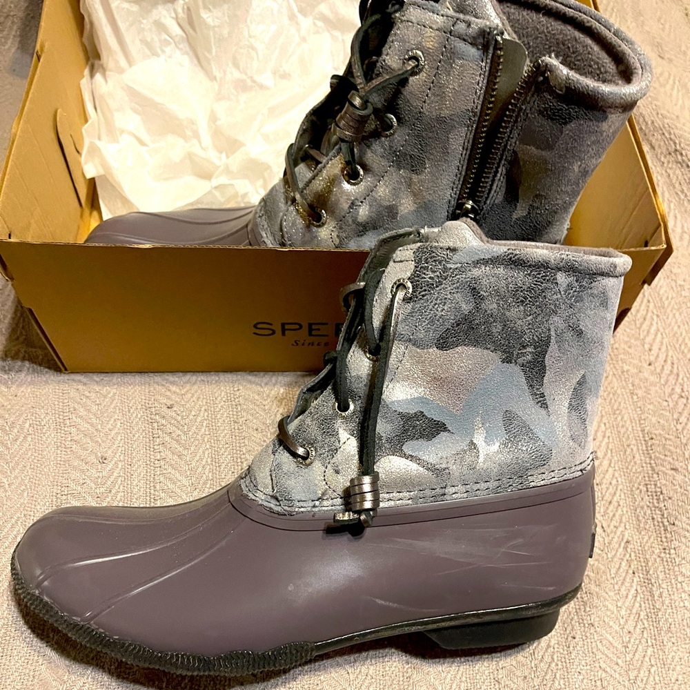 Sperry rain boots.